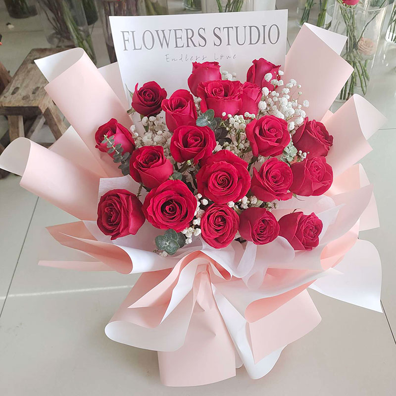 19 Red Roses Bouquet with Pastel Pink Wrapping - Romantic Gift to China | 214flowers.com