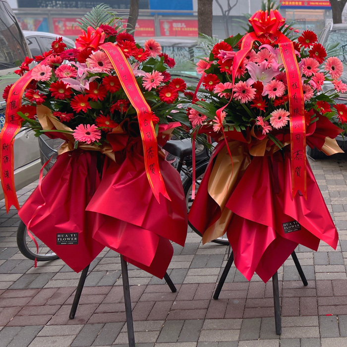 Traditional Chinese opening flower basket with 30 red gerberas and pink lily for good luck