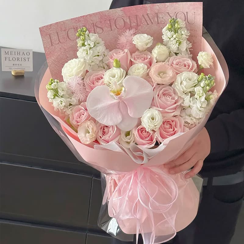 Day and night, 11 pink roses and 1 butterfly orchid