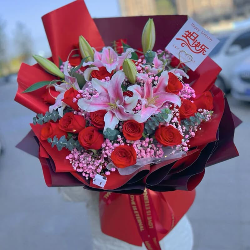 accompany you for a long time. 19 red roses, 9 pink lilies - Birthday flowers delivery to China